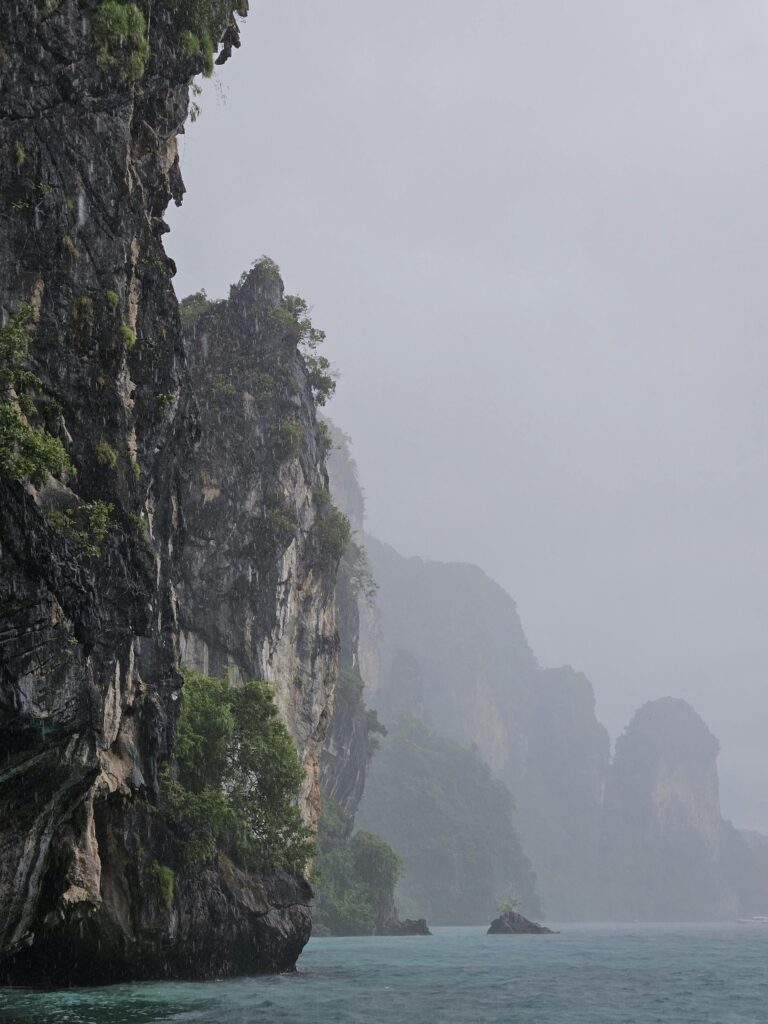 Misty limestone cliffs in krabi thailand